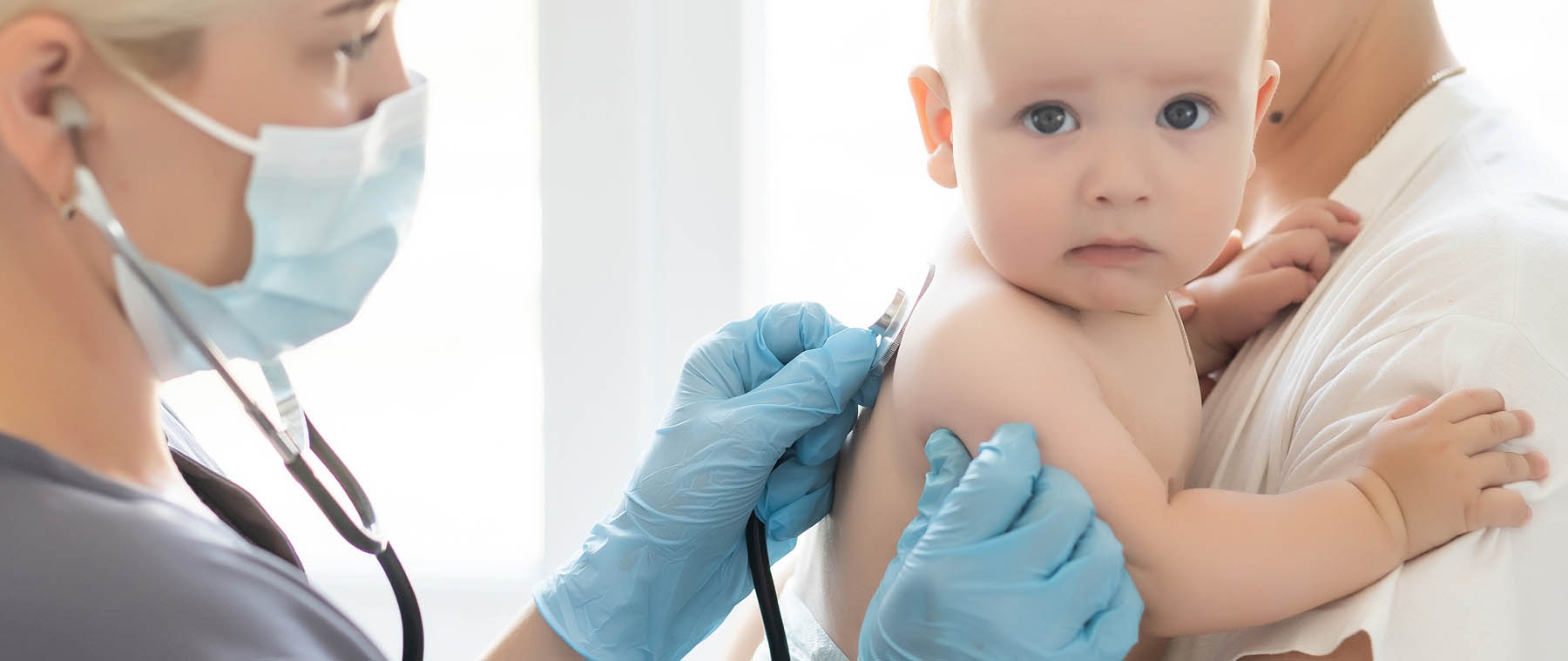 doctor with newborn baby